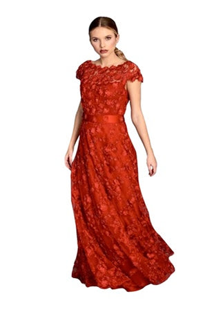A woman wearing a red elegant long evening dress