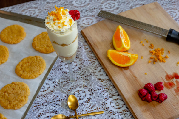 Cookie parfait surrounded by fruit and cookies