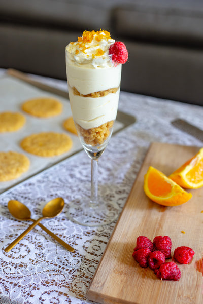 Cookie parfait surrounded by fruit and cookies