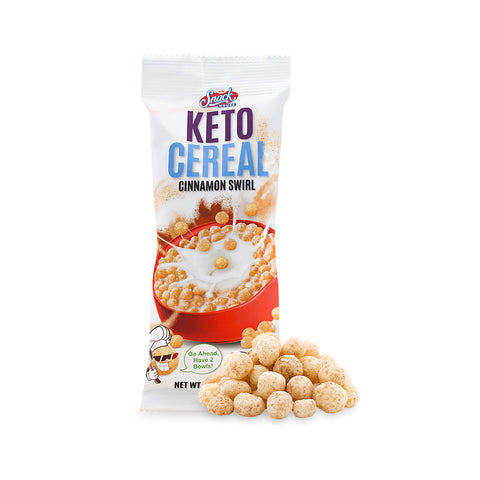 Snackhouse Cinnamon Swirl Keto Cereal package on a white background, with a pile of cinnamon swirl keto cereal surrounding it