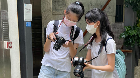 Girls having fun at street photography camp