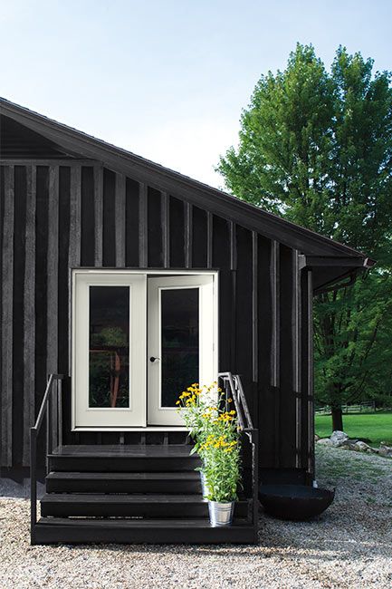 House exterior painted in Black Satin Regal Select Paint color