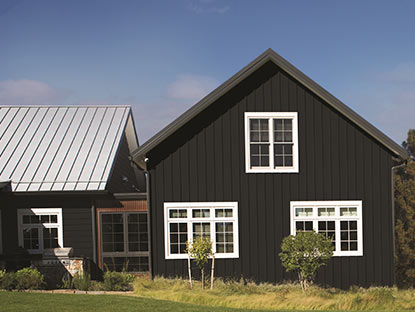 Full house exterior siding painted in Black Satin Regal Select Paint Color