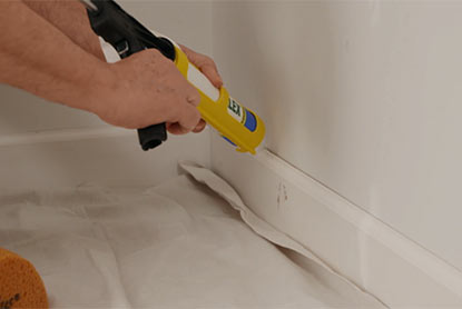 Repair trim by filling gaps between walls and trim