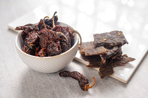 Beef Jerky in a bowl With spices 