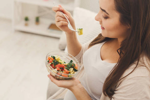 Woman eating a healthy meal 