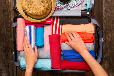 roll your clothing when packing for more space