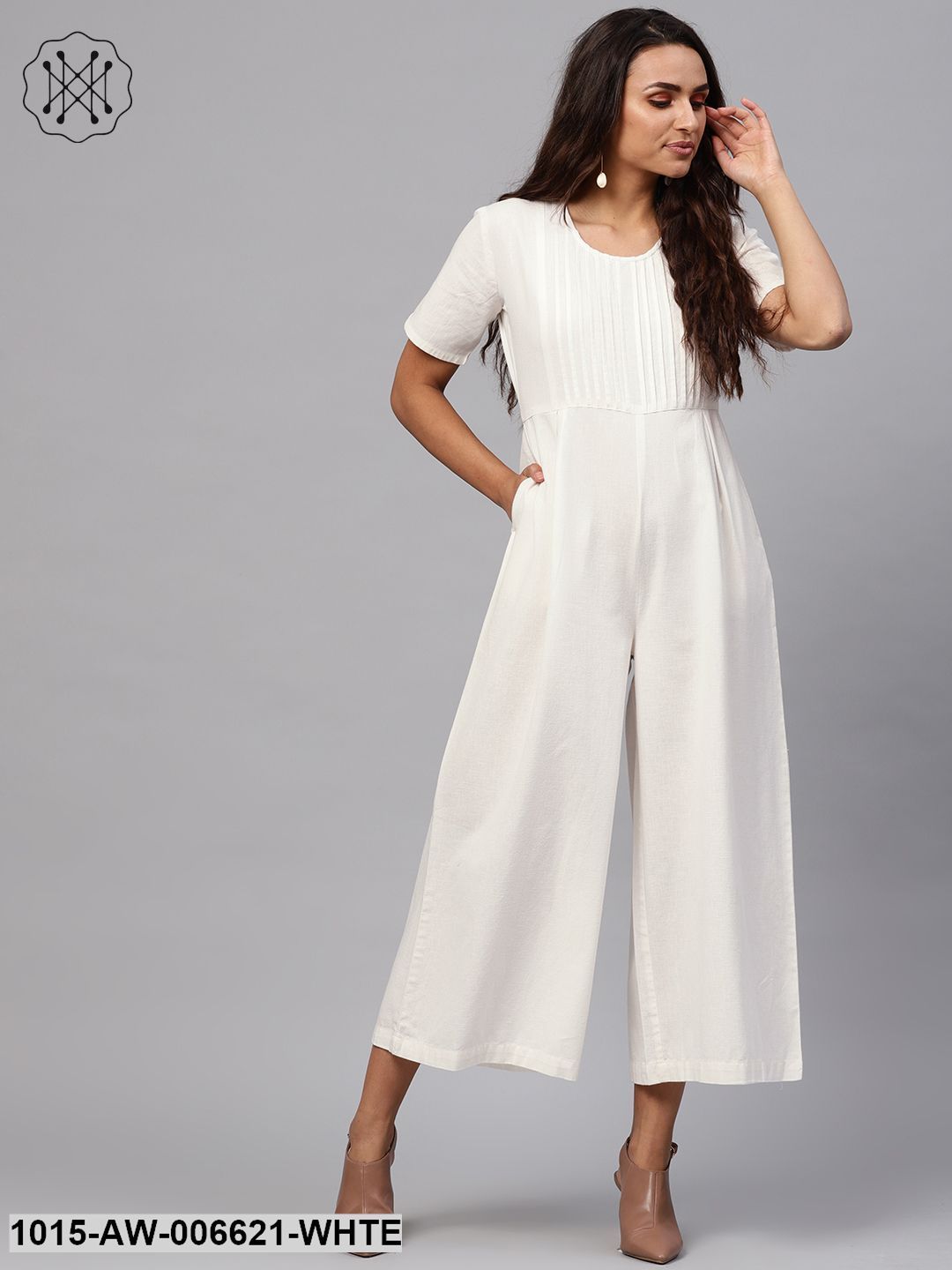 white pleated jumpsuit