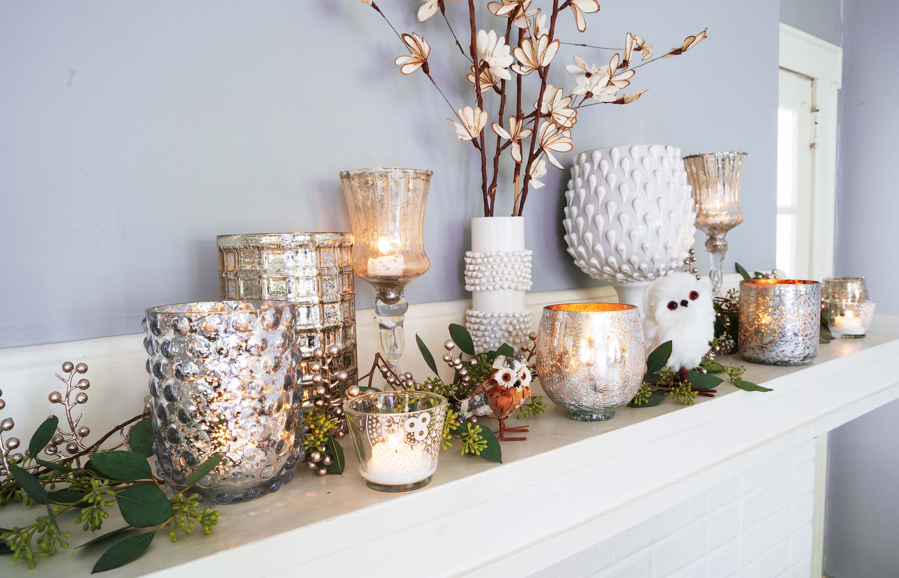 Select candles and glassware to start decorating your mantel.