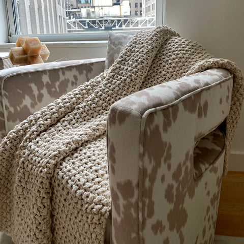 The DKNY PURE Chunky knit throw adds to any look!