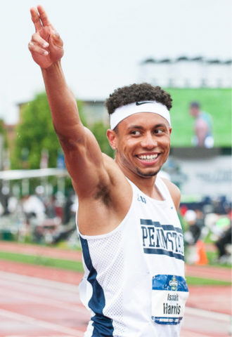 Isaiah Harris, Pro Runner with the Brooks Beasts holding two fingers in the air in a gesture of victory