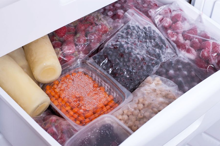 Freezer drawer with frozen food including food in jars