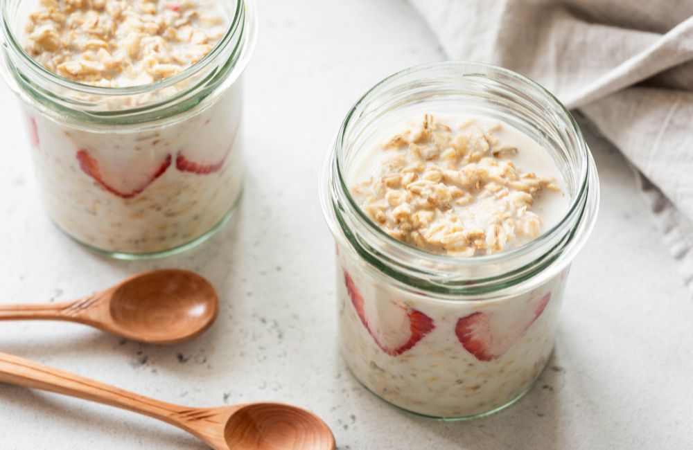 Oats, milk and strawberries in a jar