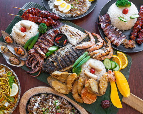 https://cdn.shopify.com/s/files/1/0021/9145/8353/files/seafood-feast-at-restaurant_480x480.jpg?v=1552720317