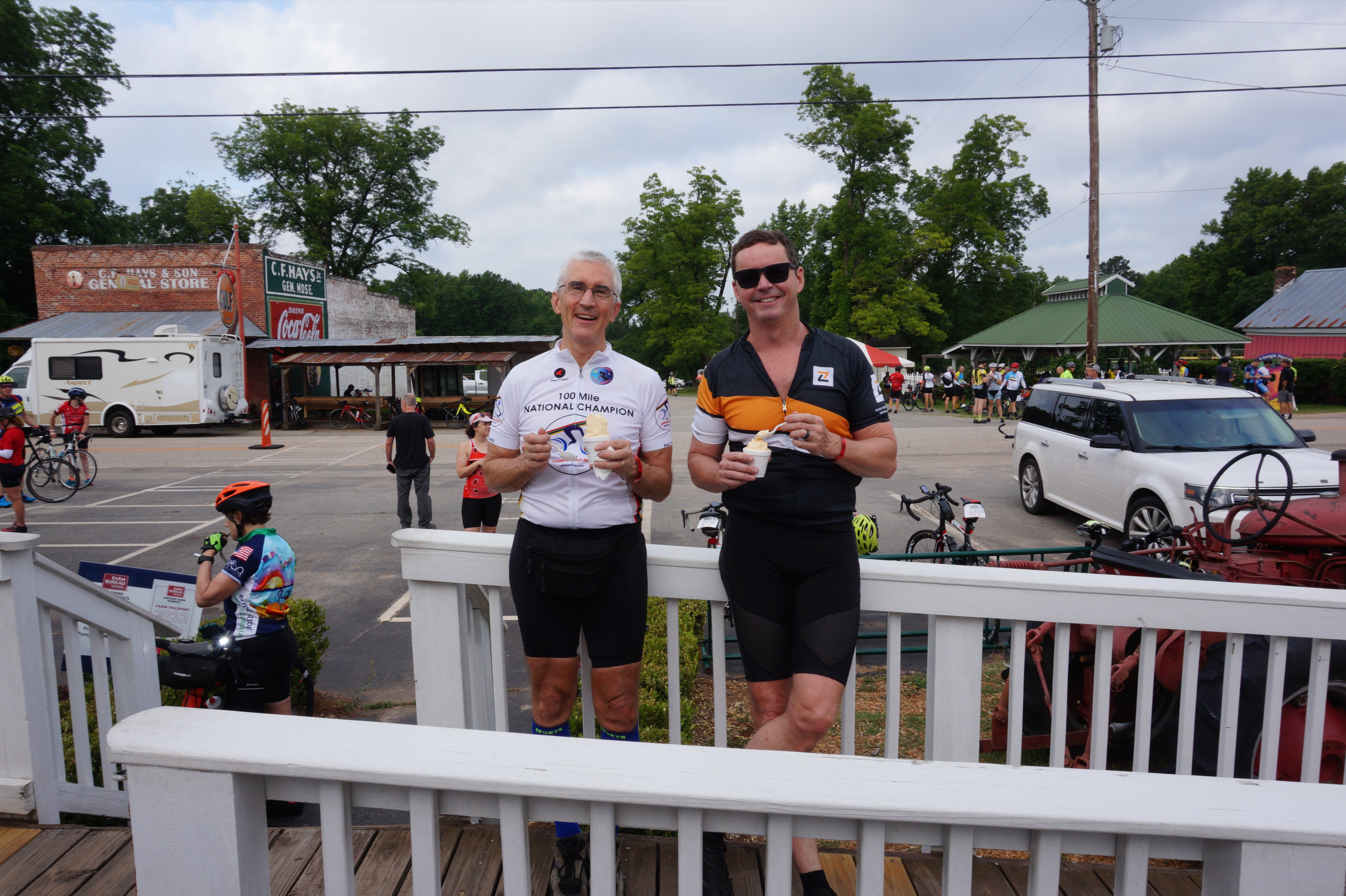 Jim Parker and Larry Oslund, Cruzbike recumbent bike riders, eat ice cream