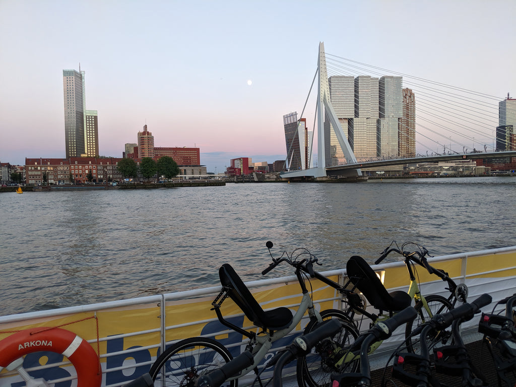 Q45 touring recumbent bikes overlooking Rotterdam as moon rises