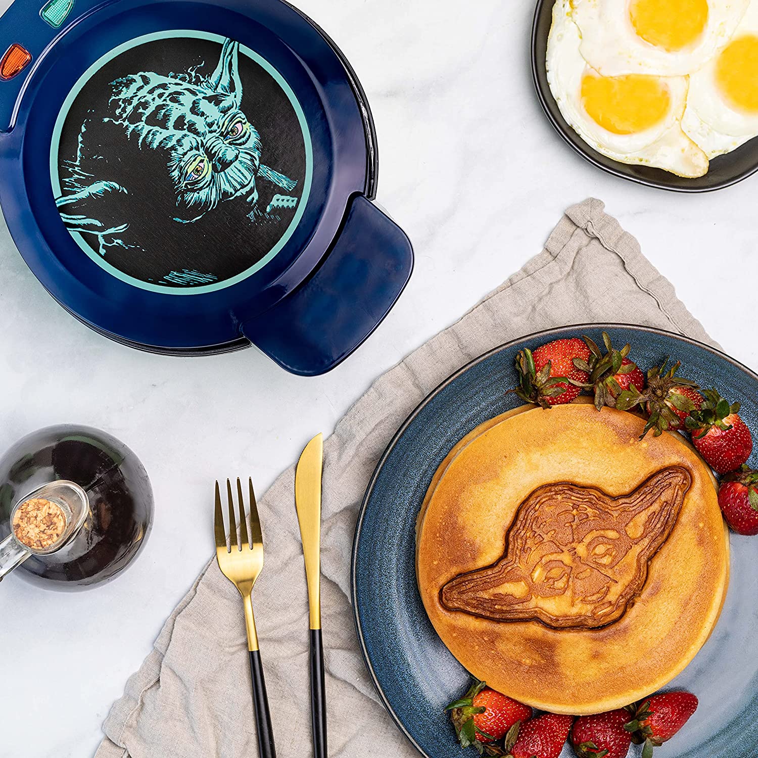 This Baby Yoda Waffle Maker Will Stamp The Child Onto Your Breakfast