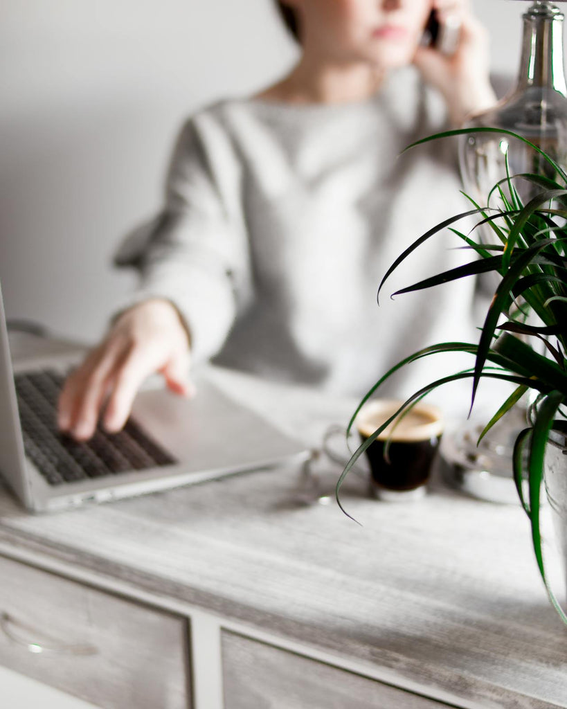 The Art of Resume | Woman at Desk Making a Resume