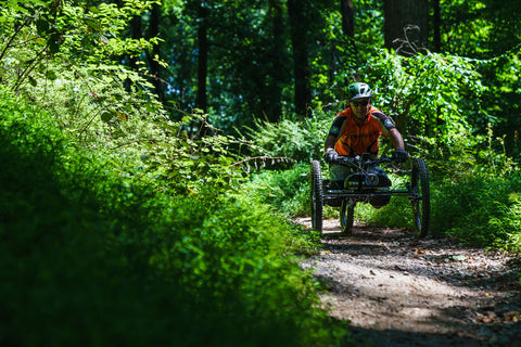 Adaptive cyclist on a trail in Patapsco