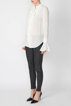 white silk blouse with a frill