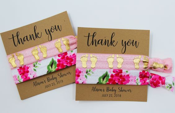 footprints and floral elastic hair ties with a “thank you” card