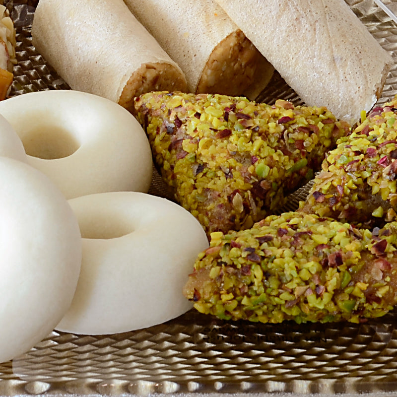 Some pieces of Kaak Warka, Samsa Pistachio, and Almond Fingers