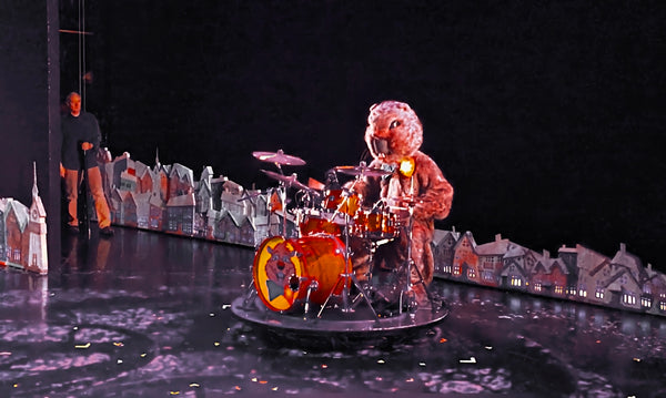 Photo of Joe Mowatt in Groundhog Costume on Stage.