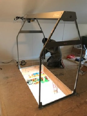 image of guy installing versalift loft lift