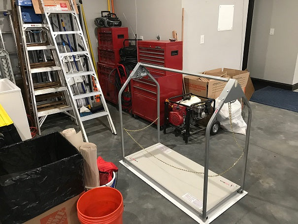 attic lift beside tool box