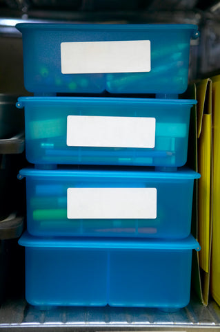 labeled storage bins, organized storage containers