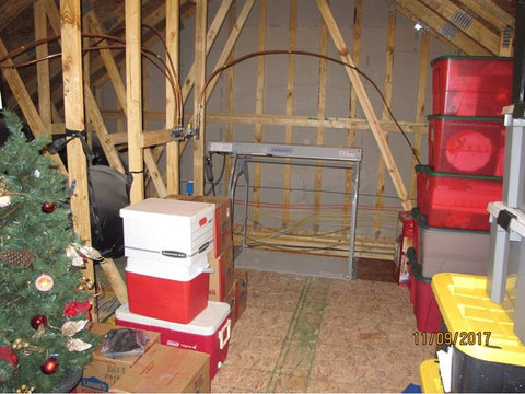 Installed VersaLift in the Attic with Christmas Decorations stored