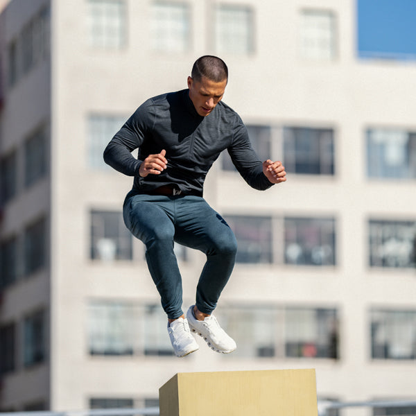 Guy climbing rock