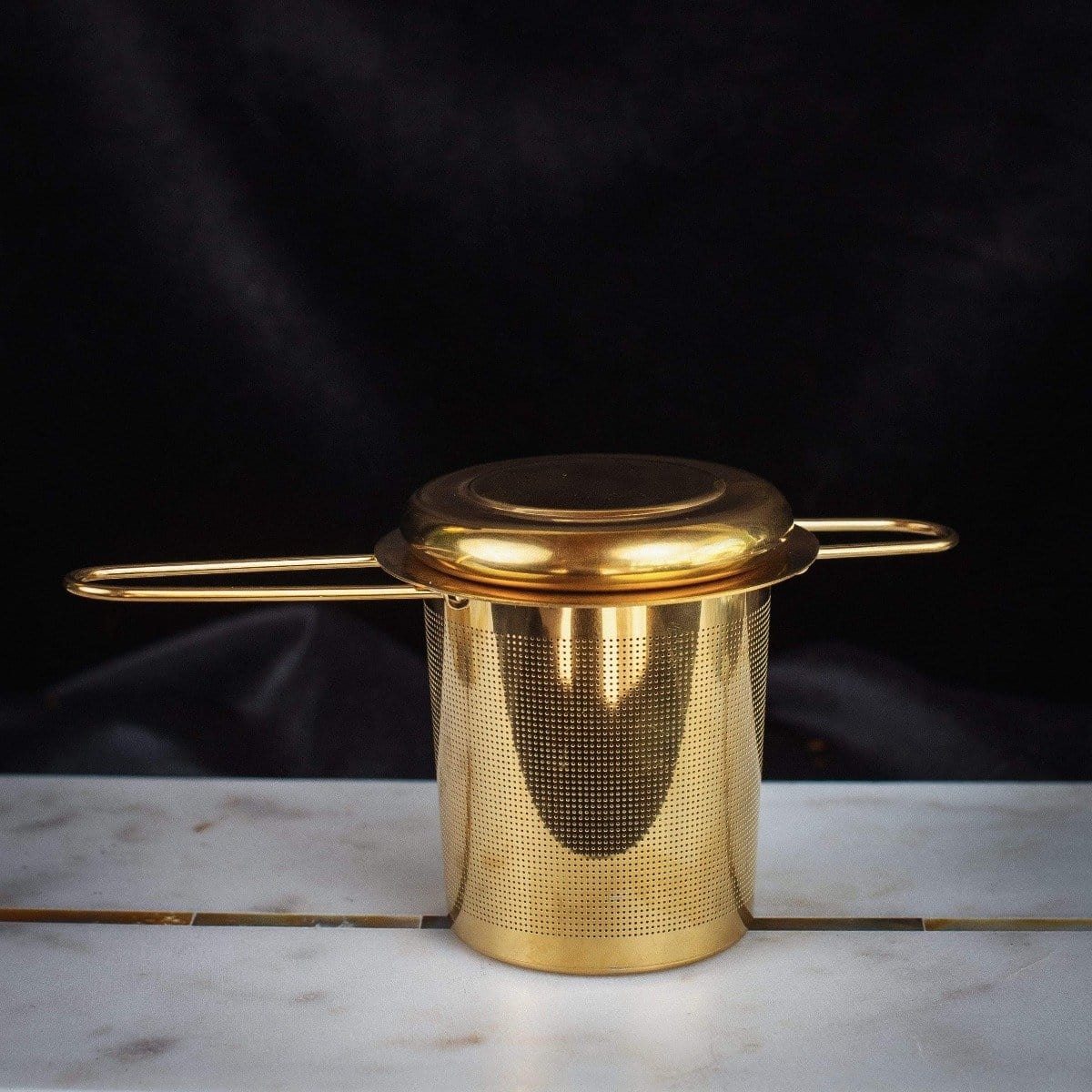 Midas Touch: Golden-Hued Tea Strainer