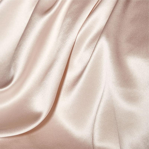 Close up of Bedsure silk pillowcase - soft, smooth, pink pillowcase that is breathable, soft on skin and hair