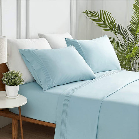 Light blue sheets on comfortable bed / Moisture-Wicking Sheet Set from Bedsure