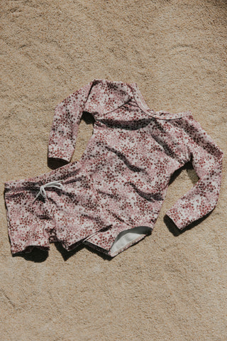 Pink floral mommy and me matching swim trunks and girls one piece swimsuit