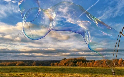 Dr Zigs Eco Ethical Bubbles flying over a field in Wales