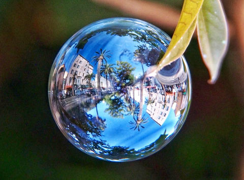 Khaled Youssef #bubblesnotwar #bubblesnotbombs image of a bubble with reflections and poetry