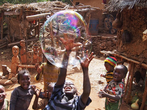 Children in Ethiopia playing with bubbles. #bubblesnotbombs Giant Bubbles Dr Zigs