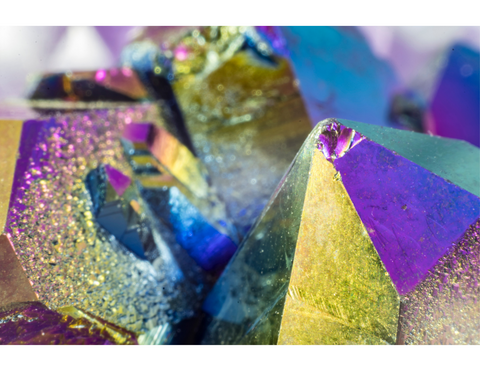 colorful rainbow aura quartz closeup photo