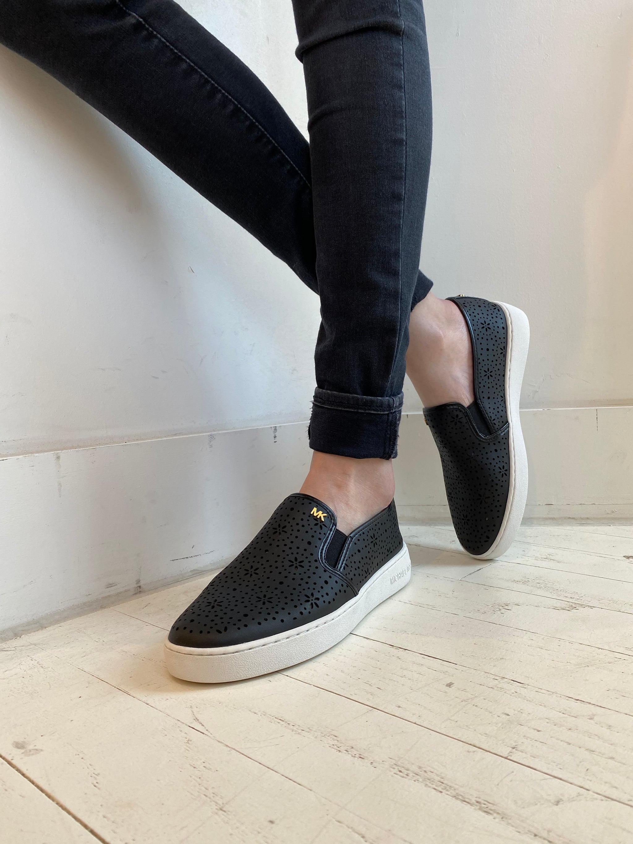 michael kors black slip on sneakers