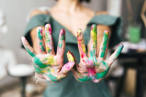 Paint on an artist's hands