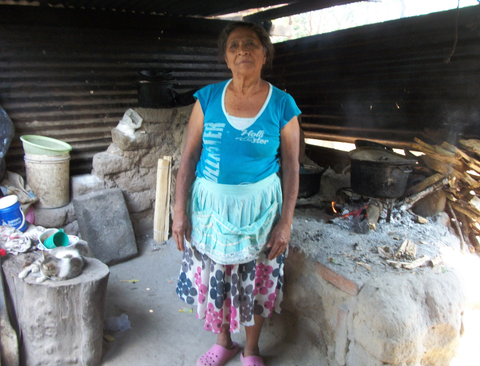 Elba’s childhood friend and retired coffee picker, Sabina. This is her kitchen in her Salvadoran home.