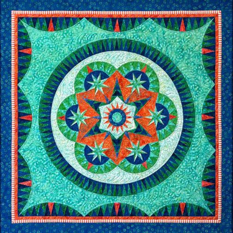 A square blue pieced batik quilt