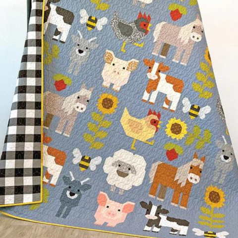 Elizabeth Hartman "Fab Farm" full quilt featuring farm animal blocks on a blue background