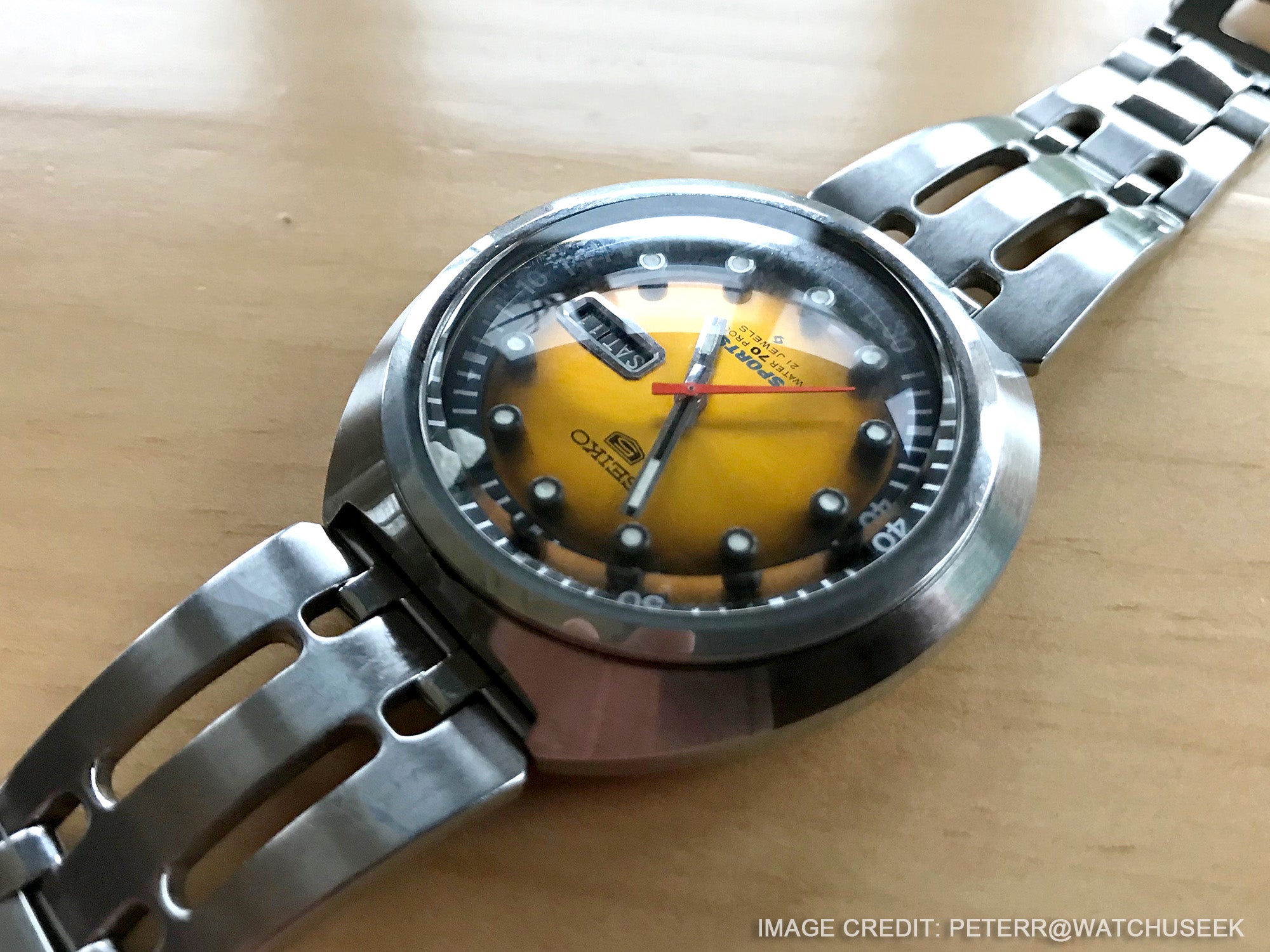 Seiko Gold Sushi 6119-7160 watch is paired with a rally bracelet by Strapcode 