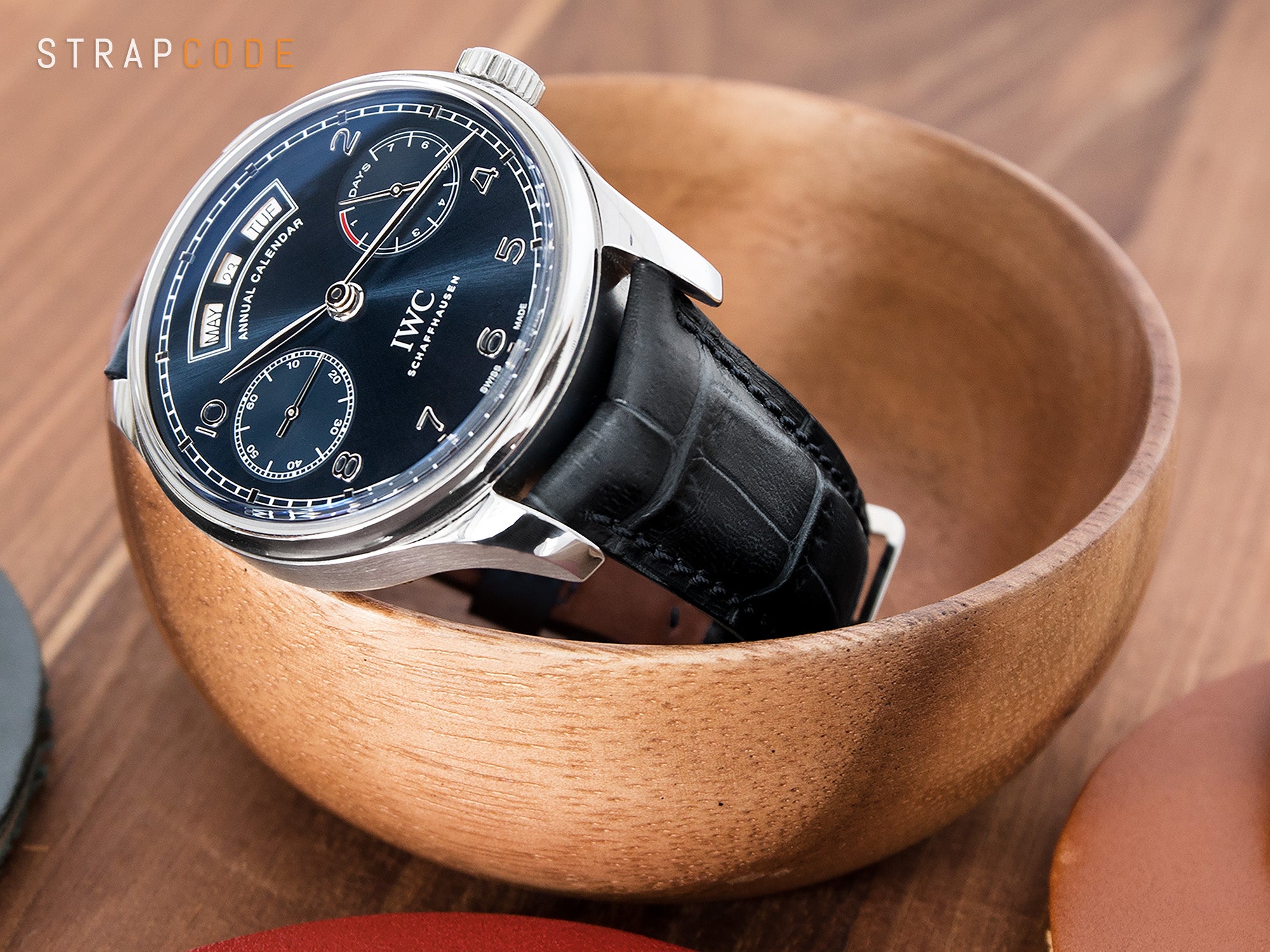 The CrocoCalf leather of the semi-curved lug watch band by Strapcode,  IWC Portuguese Annual Calendar Midnight Blue Dial IW503502.