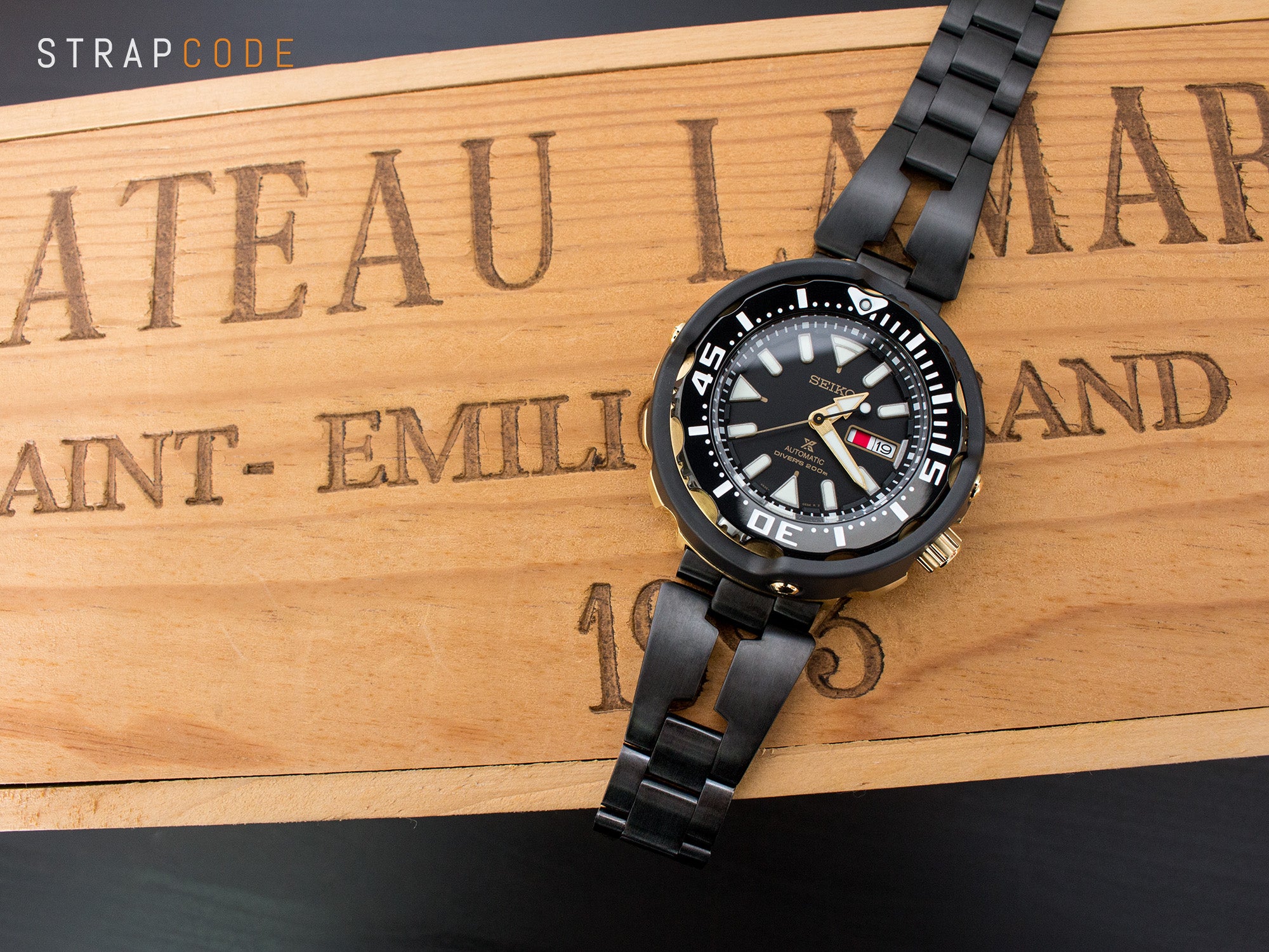 Seiko Baby Tuna SRPA82K1 has a rugged all-black appearance with a PVD Black Razor bracelet by Strapcode 