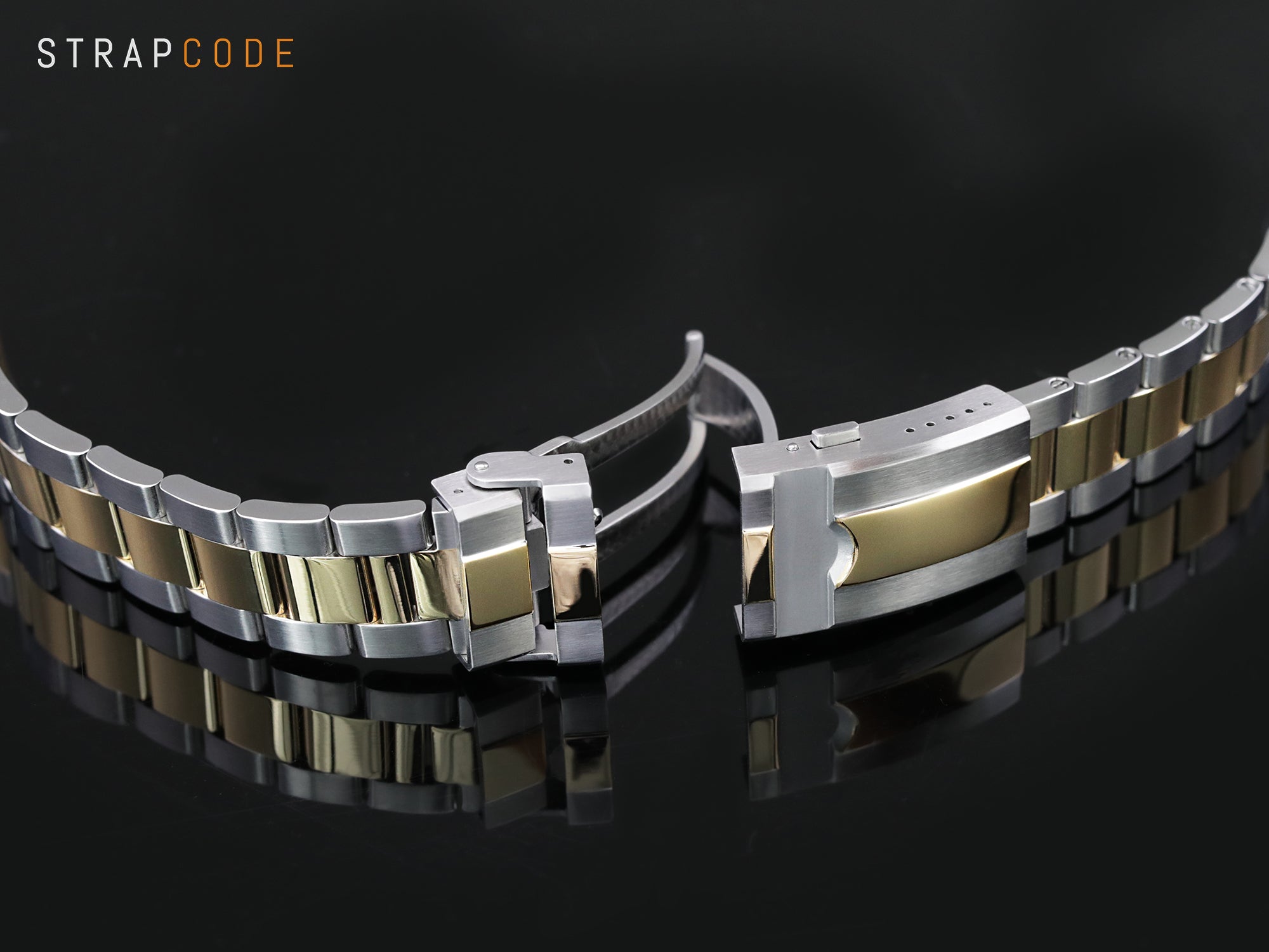 A watch diver's clasp features a double-lock flip details by Strapcode watch bands