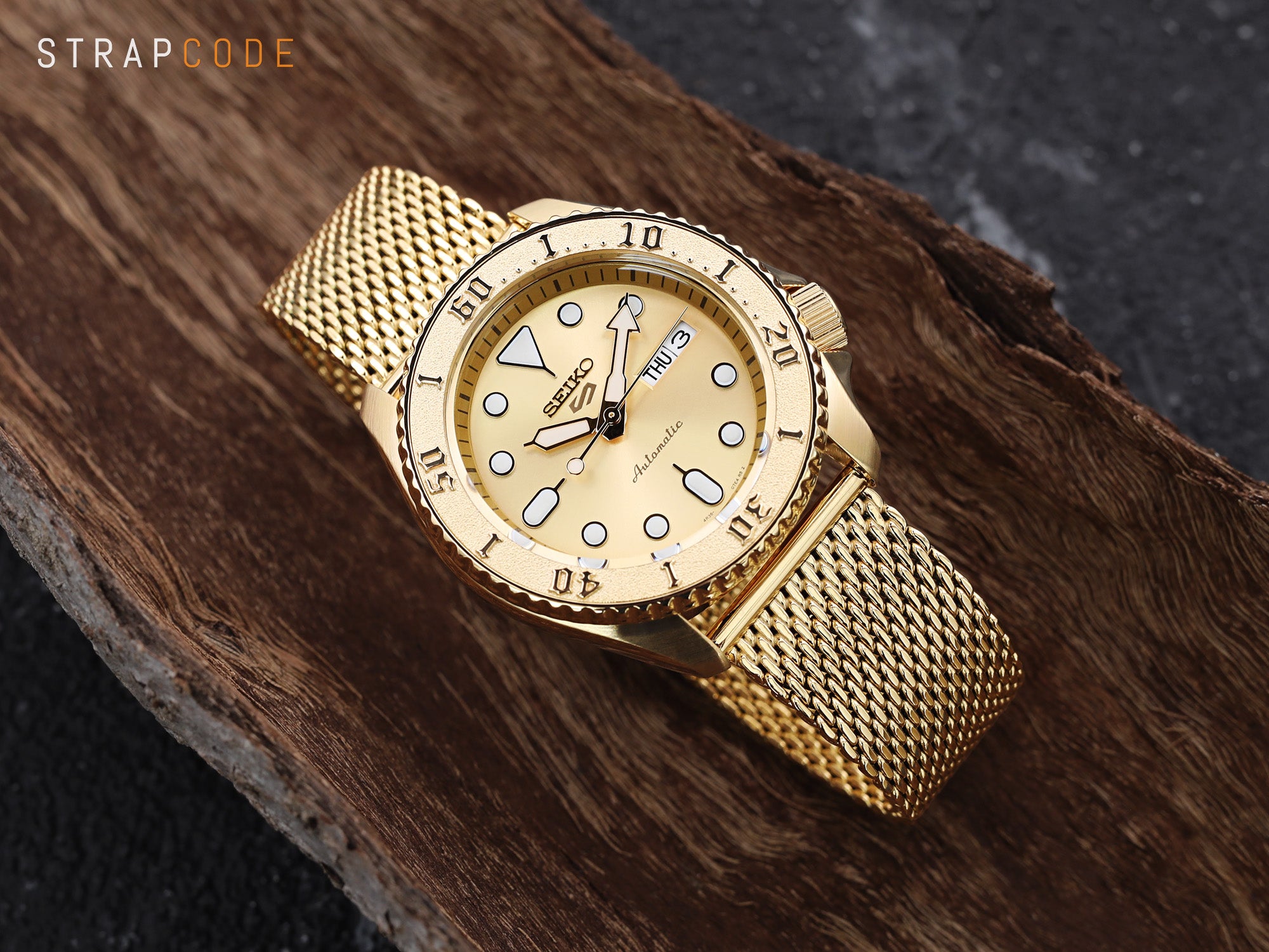 Gold Quick Release Tapered Milanese Mesh watch band by Strapcode perfectly complements the Seiko 5 Sports SRPE74K1 Gold watch